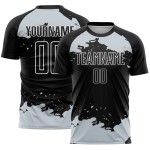 Frammento di maglia da calcio nera personalizzata con stampa sublimatica in bianco e argento Frammento di maglia da calcio nera personalizzata con stampa sublimatica in bianco e argento