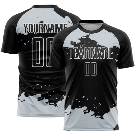 Frammento di maglia da calcio nera personalizzata con stampa sublimatica in bianco e argento Frammento di maglia da calcio nera personalizzata con stampa sublimatica in bianco e argento